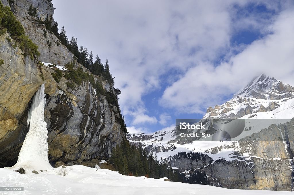 Frozen waterfall Frozen waterfall at the Oeschinen Lake in the Swiss Alps. Ice Stock Photo