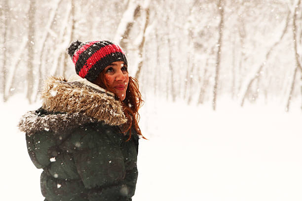 istock Beautiful Young Woman posing in Snow 162308401