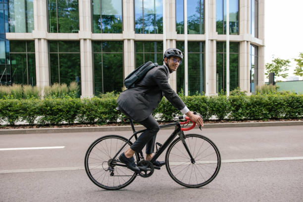istock Young man on bike looking confident and contented 1623098388