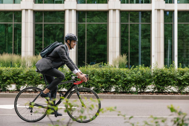 istock Young man on bike looking confident and contented 1623098392