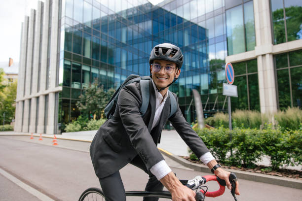 istock Young man on bike looking confident and contented 1623098398