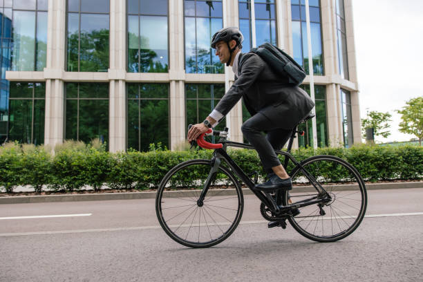 istock Young man on bike looking confident and contented 1623098434