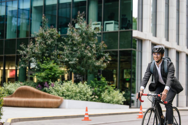 istock Young manager comuting to the office by electic scooter 1623098437