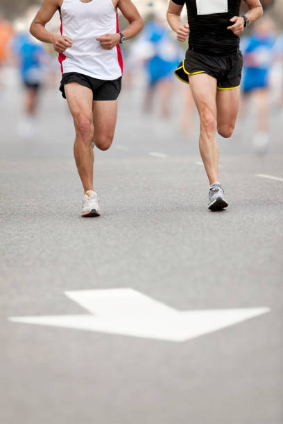 istock Leading position of two runners at city marathon 162309904