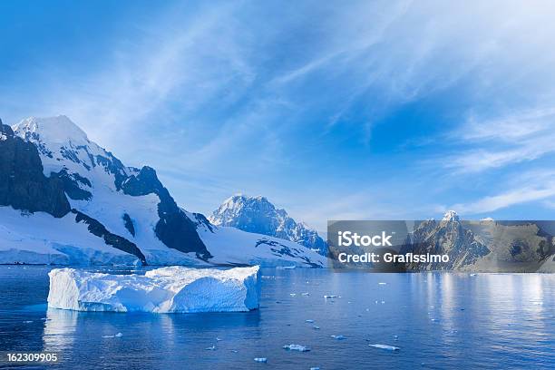 Antarctica Lemaire Channel Snowy Mountain Stock Photo - Download Image Now - Antarctica, Iceberg - Ice Formation, Ice Floe