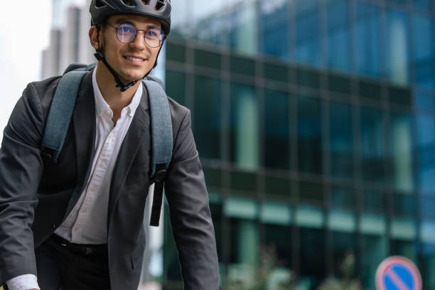 istock Young manager comuting to the office by electic scooter 1623099553