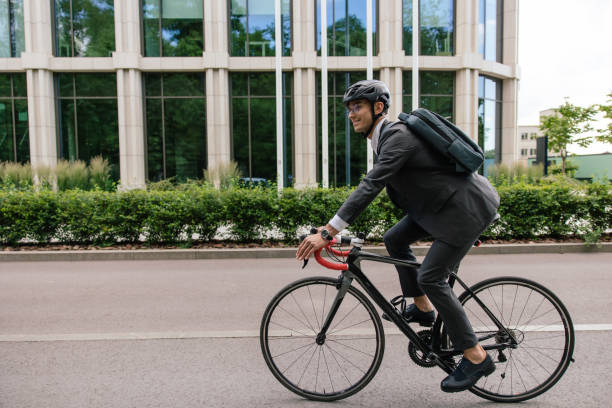 istock Young man on bike looking confident and contented 1623099560