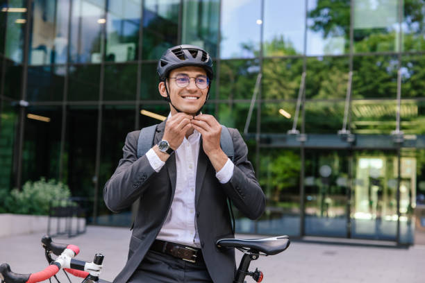 istock Smiling male businessman with bicycle 1623100725