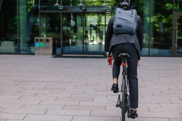 istock Young businessman commuting to work on bicycle 1623100762