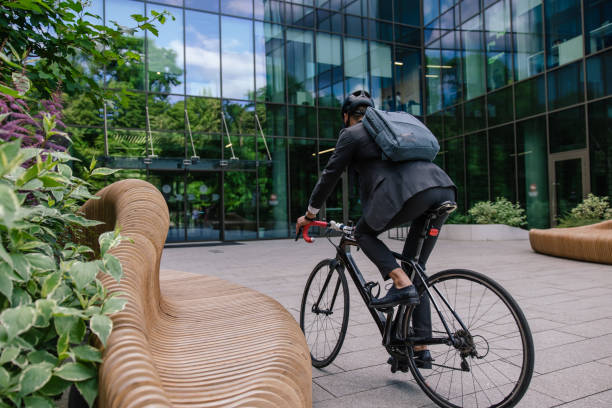 istock Young manager commuting to the office on a bike 1623103431