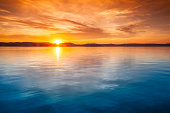 istock Sunset over water 162311100