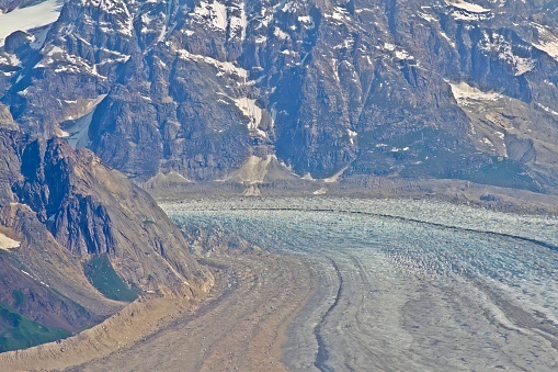 Aerieal view of peaks and valleys of Denali National Park mountain range with blue skies and copy space, Alaska.