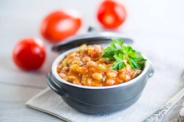 istock Cooked white beans with zucchini and other vegetables. 1623134320