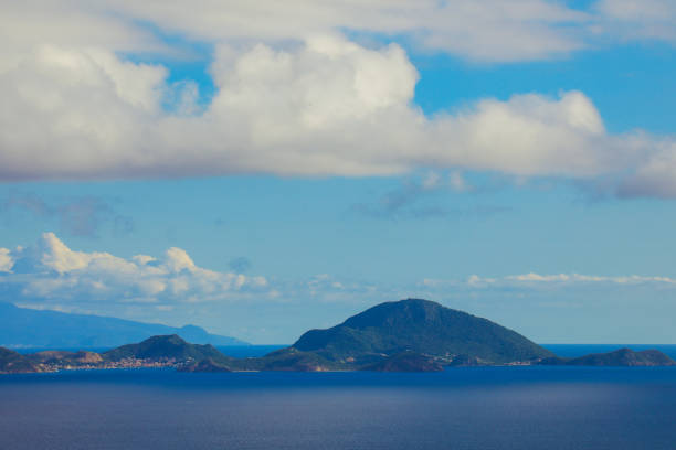 istock Panoramic View to the Guadeloupe Island under the Blue Clouds 1623154397