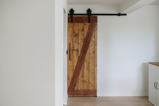 Rustic sliding door inside a house