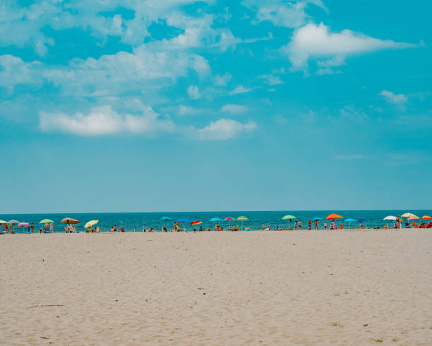 istock Beautiful view of sandy beach and seascape under blue sky 1623161481