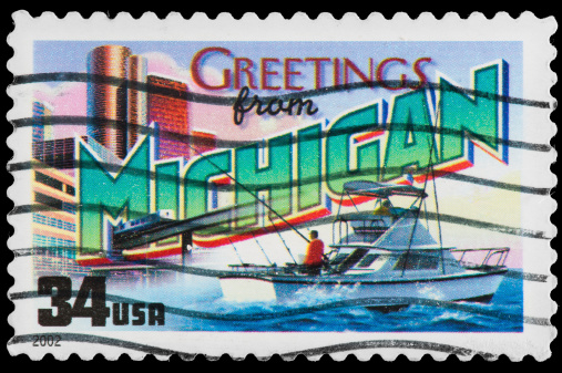 Michigan State Postage Stamp GREETINGS FROM AMERICA Retro Postcard Theme. High Resolution X-LARGE size available.