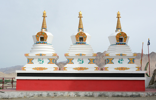 White stupas at the Tibetan monastery in Ladakh, northern India. Ladakh is one of the most sparsely populated regions in Jammu and Kashmir.