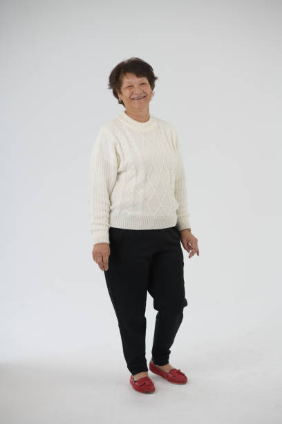Full length Smiling Senior Woman Studio Portrait stock photo