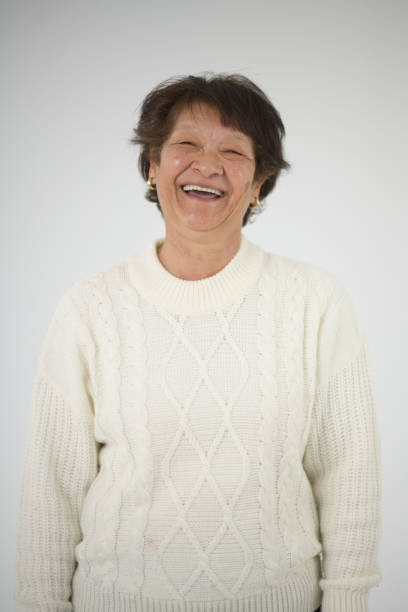 istock Laughing Senior Woman Studio Portrait 1623195357
