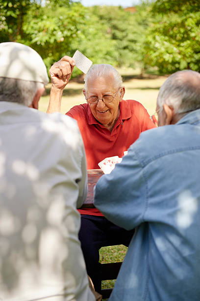 istock Active retired people, two senior men playing chess at park 162319706