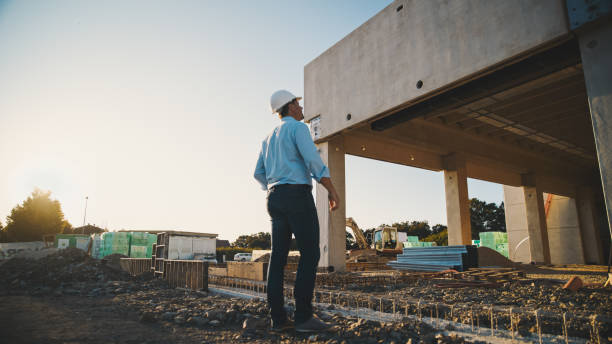 istock Building engineer gazes attentively at construction site 1623198060