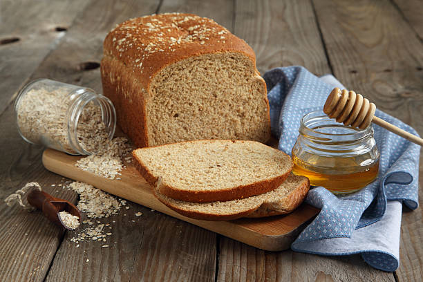avena y pan de miel - oat wheat oatmeal cereal plant fotografías e imágenes de stock
