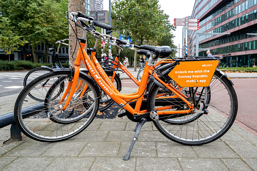 Rotterdam, Netherlands - September 25, 2021: Donkey Republic bikes nearby Rotterdam Blaak station