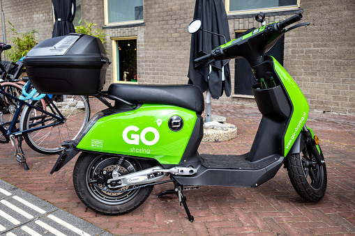 Rotterdam, Netherlands - September 25, 2021: GO sharing e-Scooter nearby Rotterdam Blaak station
