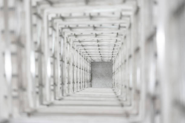 Top angle view of the white reinforced steel bar framework column construction in the work site.