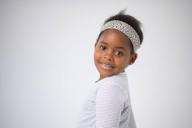 Cute Beautiful Confident African Young Girl Studio Looking over shoulder Portrait
