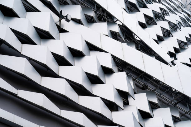 istock modern Aluminium composite material architecture gray color and Hexagon shape popup texture on exterior facade building. 1623207395