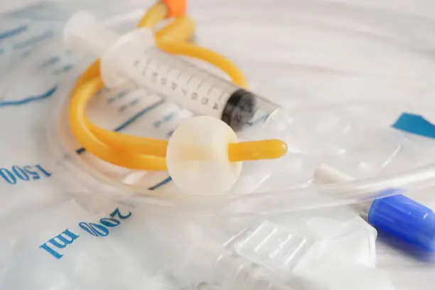 Foley catheter and urine drainage bag collect urine for disability or patient in hospital.