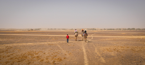 Jaisalmer, India - Mar 4, 2012. Camel riding on Thar Desert in Jaisalmer, India.