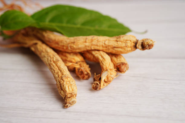 istock Ginseng roots and green leaf, healthy food. 1623229271