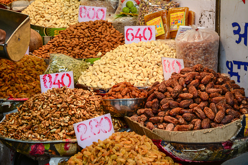 Dried nuts for sale at local market in Old Delhi, India.