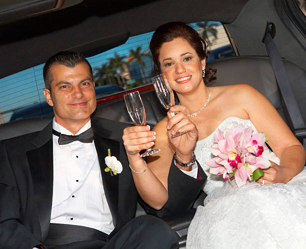 istock Happy Bride And Groom With Champagne Flutes 162324518