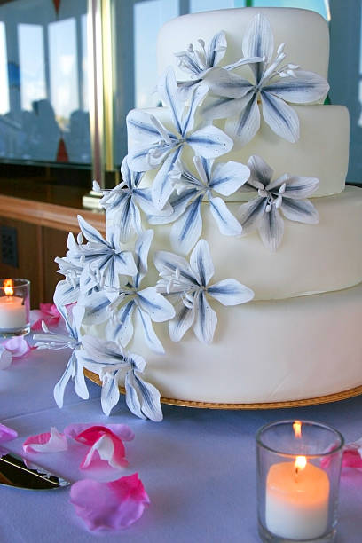 istock Wedding Cake With Flowers And Candle 162326893