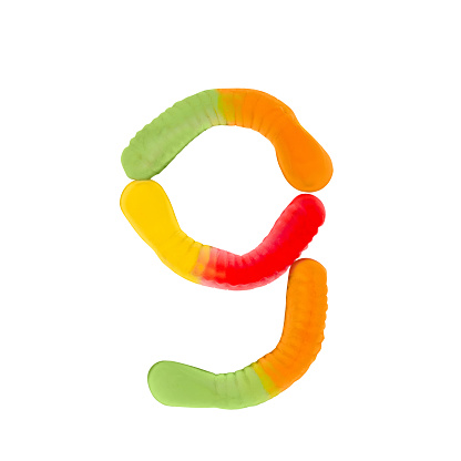 Number 9 made of gummi worms and isolated on pure white background. Food numeral concept. One number of the set of sweet food font easy to stacking