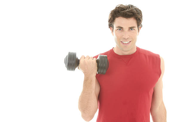 young caucasion male doing a workout isolated on white with copy space.