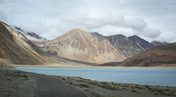 View of Pangong Lake at winter in Ladakh, India. Pangong is an endorheic lake in the Himalayas situated at a height of about 4,350m.
