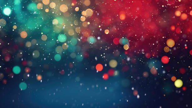 Creative background image is blurred evening city lights and light snowfall. Abstract festive blurred background with beautiful glowing particles and round bokeh. Dark evening blue and red background for christmas or party. vacations stock pictures, royalty-free photos & images