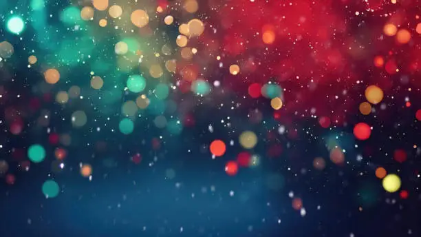 Photo of Creative background image is blurred evening city lights and light snowfall.
