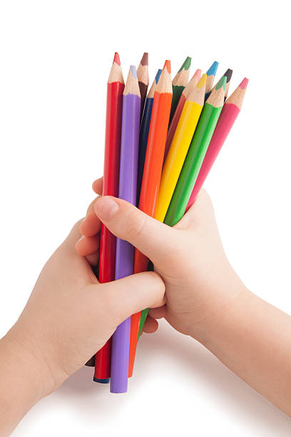 istock Color pencils in child hands 162334874