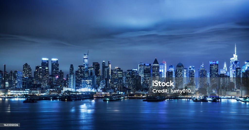 Les toits de Manhattan de nuit - Photo de Nuit libre de droits