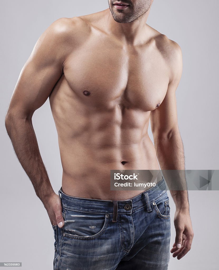 Muscular male torso Muscular male torso. Abdominal Muscle Stock Photo