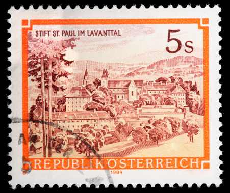 Traditiona Buildings and Rural Landscape on Vintage Austrian Postage Stamp Illustrated in Sepia Tones