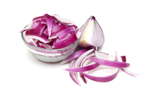 istock Red onion rings on white background 1623441375