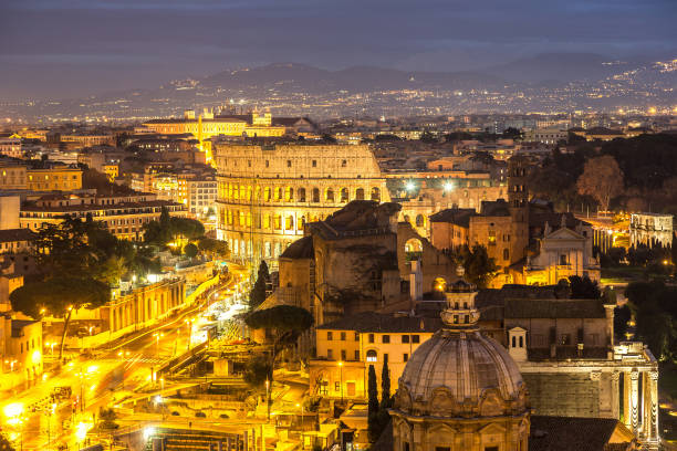 istock Colosseum at night in Rome 1623477351