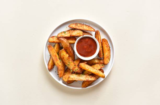 Oven baked potato wedges with sauce
